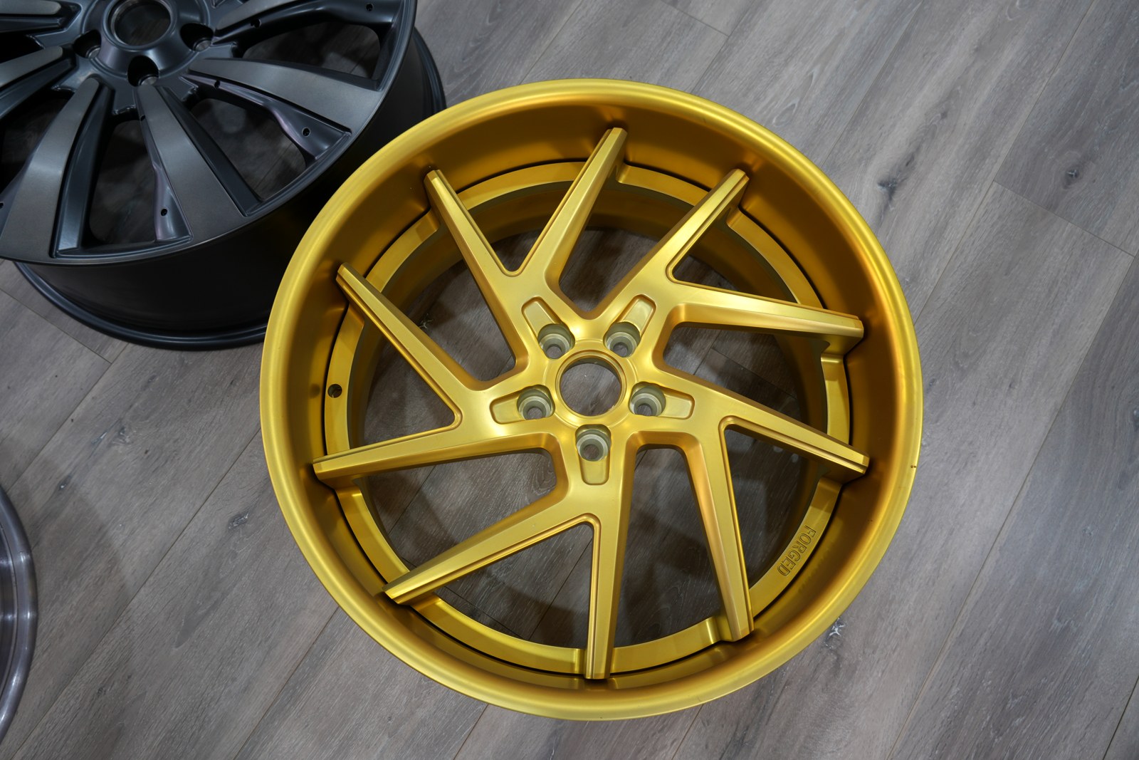 About Us Gold Wheel